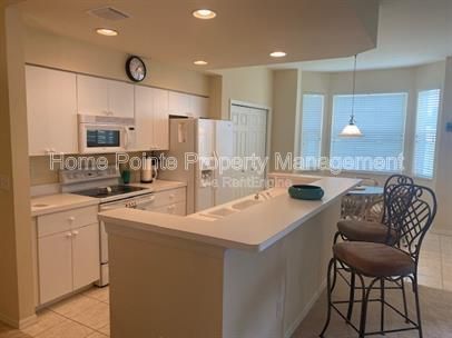 Furnished 2BR/2BA Condo with Lake View in Villages at Country Creek property image
