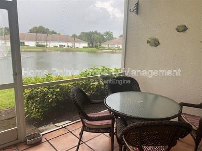 Furnished 2BR/2BA Condo with Lake View in Villages at Country Creek property image