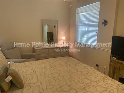 Furnished 2BR/2BA Condo with Lake View in Villages at Country Creek property image