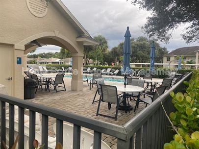 Furnished 2BR/2BA Condo with Lake View in Villages at Country Creek property image