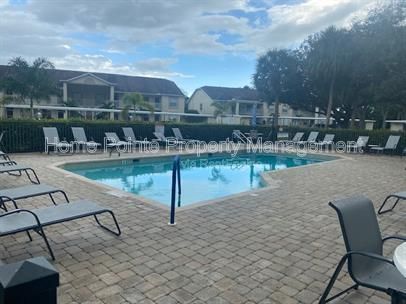 Furnished 2BR/2BA Condo with Lake View in Villages at Country Creek property image