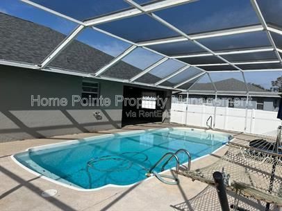 Pool Home in San Carlos Park | 3BR + 2BA | Screened Lanai | $2,795/mo property image