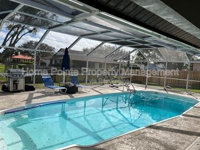 Pool Home in San Carlos Park | 3BR + 2BA | Screened Lanai | $2,795/mo property image