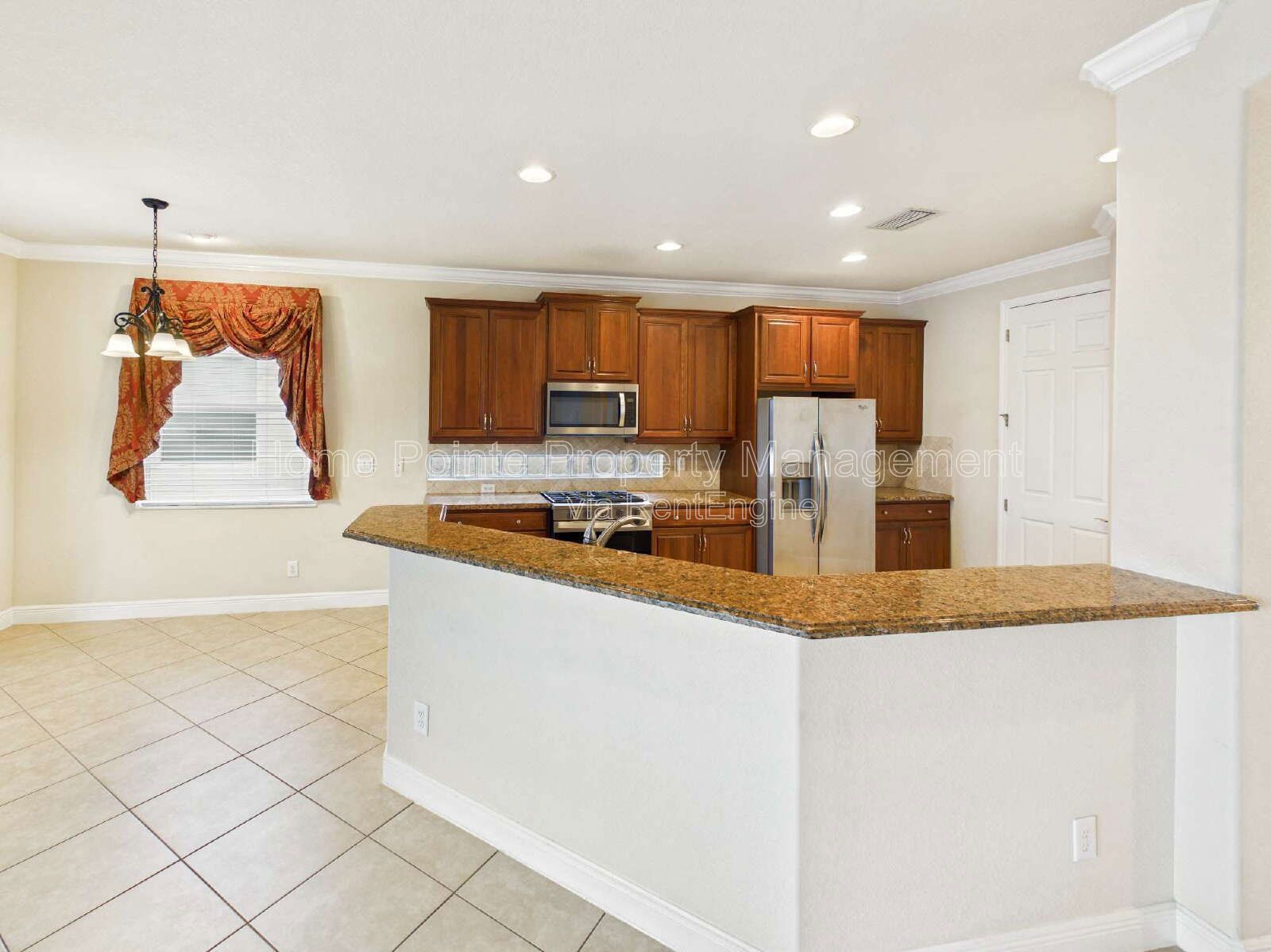 Luxury Lakefront Pool Home in Tesoro - Move-in Ready with Premium Inlcusions property image