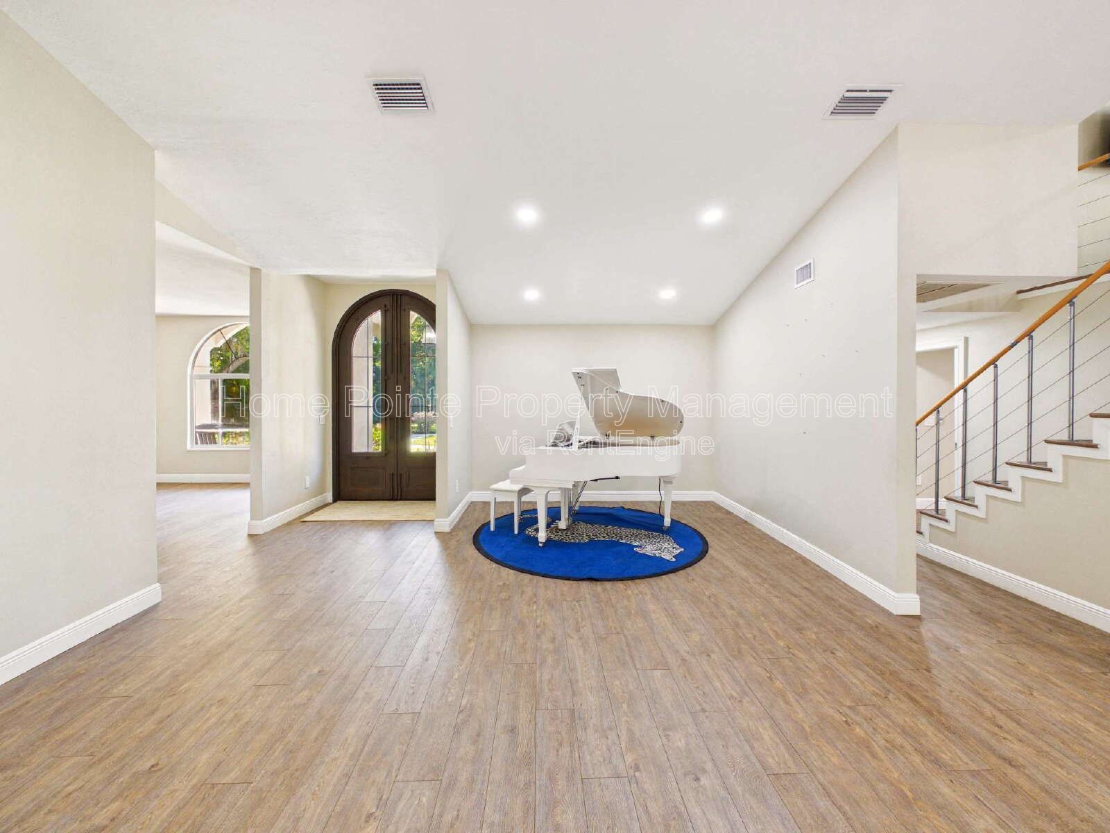 Elegant Two-Story Home with 4 Bedrooms, Den, and Ample Parking property image