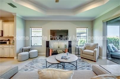 Gorgeous 2 bedroom villa sits lakefront in the resort-style community of Watermark in sunny Fort Myers, FL. property image