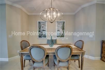 Gorgeous 2 bedroom villa sits lakefront in the resort-style community of Watermark in sunny Fort Myers, FL. property image