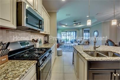 Gorgeous 2 bedroom villa sits lakefront in the resort-style community of Watermark in sunny Fort Myers, FL. property image