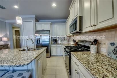 Gorgeous 2 bedroom villa sits lakefront in the resort-style community of Watermark in sunny Fort Myers, FL. property image