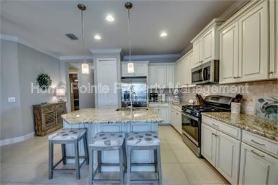 Gorgeous 2 bedroom villa sits lakefront in the resort-style community of Watermark in sunny Fort Myers, FL. property image