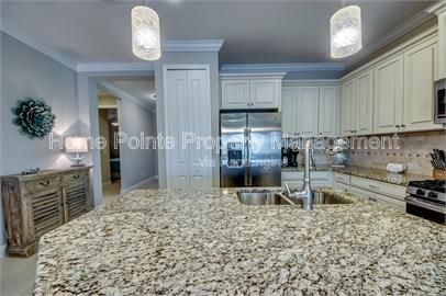 Gorgeous 2 bedroom villa sits lakefront in the resort-style community of Watermark in sunny Fort Myers, FL. property image