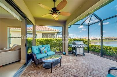 Gorgeous 2 bedroom villa sits lakefront in the resort-style community of Watermark in sunny Fort Myers, FL. property image