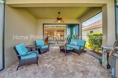 Gorgeous 2 bedroom villa sits lakefront in the resort-style community of Watermark in sunny Fort Myers, FL. property image