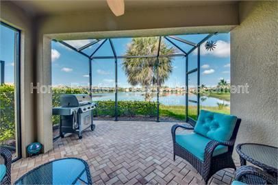 Gorgeous 2 bedroom villa sits lakefront in the resort-style community of Watermark in sunny Fort Myers, FL. property image