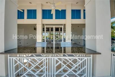 Gorgeous 2 bedroom villa sits lakefront in the resort-style community of Watermark in sunny Fort Myers, FL. property image