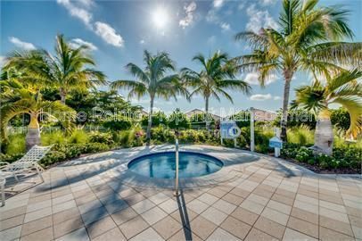 Gorgeous 2 bedroom villa sits lakefront in the resort-style community of Watermark in sunny Fort Myers, FL. property image