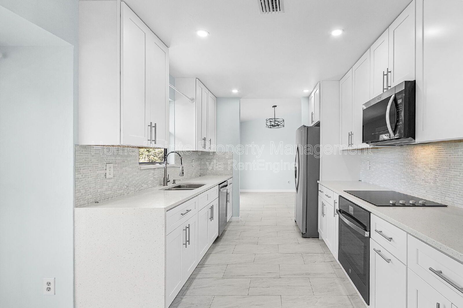 Charming 4BR Home with Garage, Lanai & Serene Waterfront Setting property image