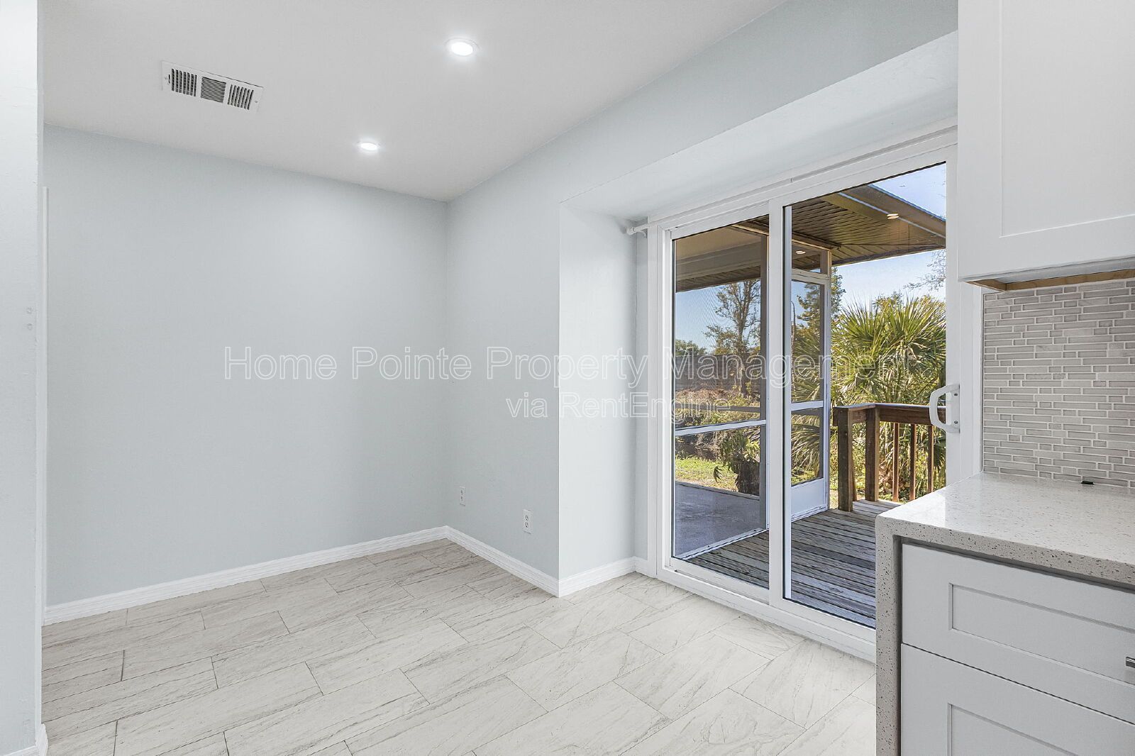 Charming 4BR Home with Garage, Lanai & Serene Waterfront Setting property image