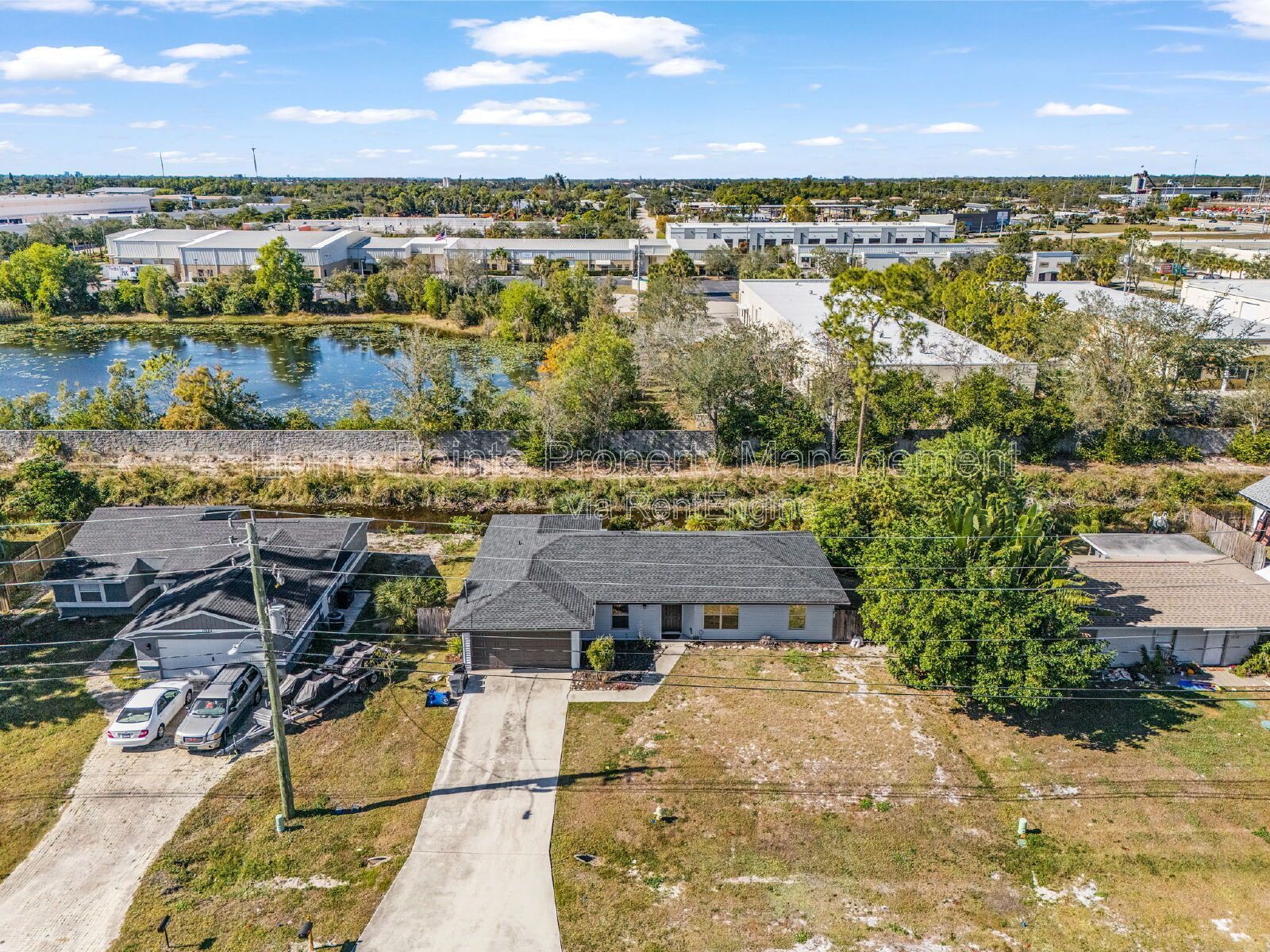 Charming 4BR Home with Garage, Lanai & Serene Waterfront Setting property image