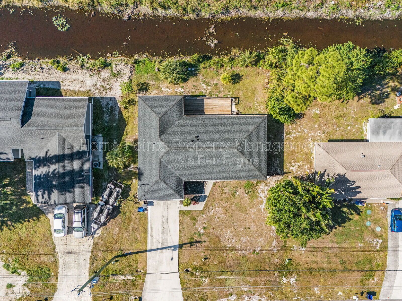 Charming 4BR Home with Garage, Lanai & Serene Waterfront Setting property image